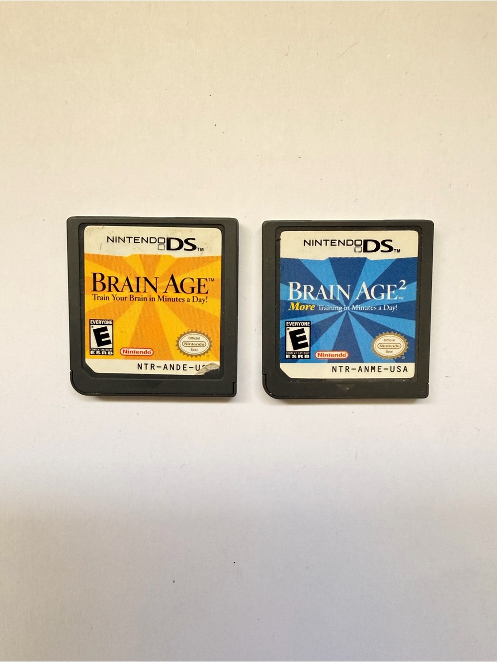 Nintendo DS Brain Age Bundle - Yellow & Blue Game Cards